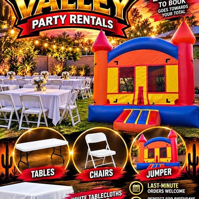 Bounce house with tables and chairs set up by Valley Party Rentals